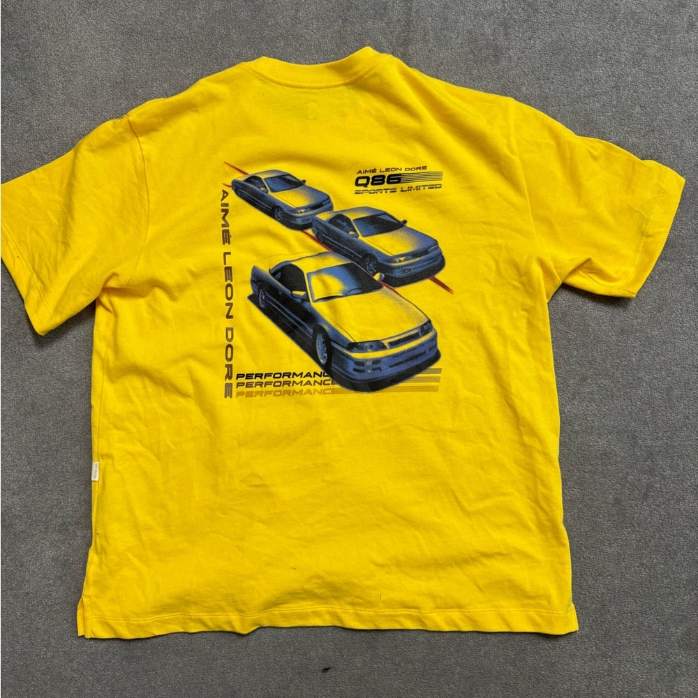 Aime Leon Dore Yellow Graphic Tee